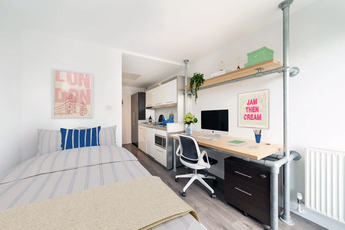Study desk and sleeping area in Bronze Studio at Spitalfields Residence London