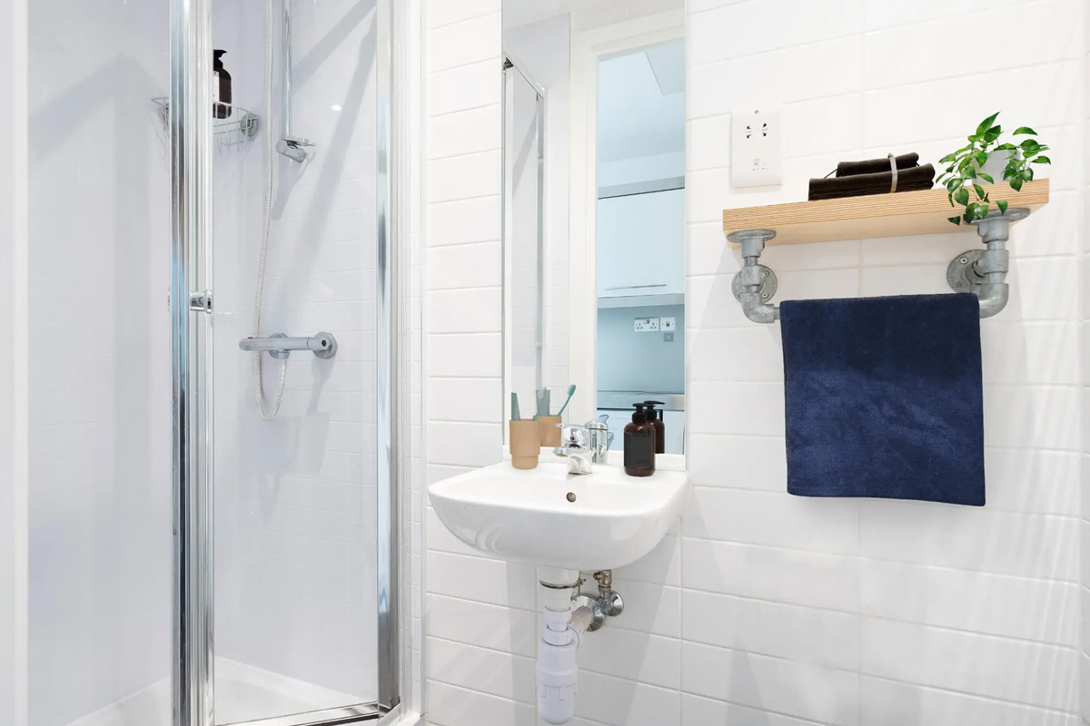Private bathroom with shower in Bronze Studio at Spitalfields Residence London